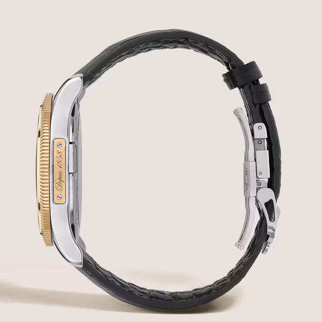 Montblanc Minerva Unveiled Crownless watch with a gold-colored guilloché dial, rose gold fluted bezel, stainless steel case, small seconds display, and dark green alligator strap.