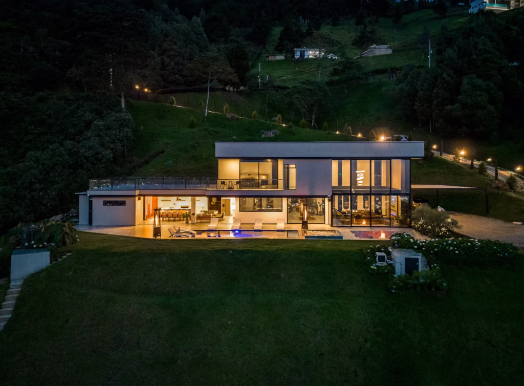 Casa Alba luxury villa in Medellín with private pool, hot tub, mountain views, and outdoor lounge space in Las Palmas