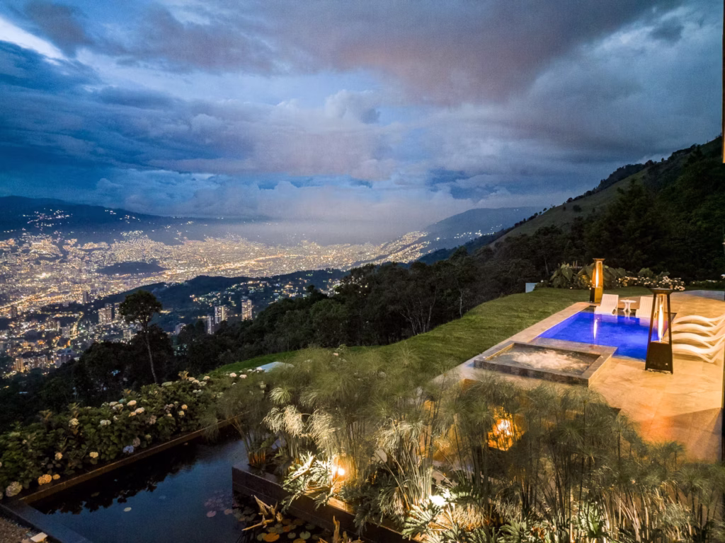 Casa Alba luxury villa in Medellín with private pool, hot tub, mountain views, and outdoor lounge space in Las Palmas