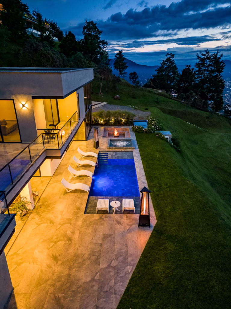 Casa Alba luxury villa in Medellín with private pool, hot tub, mountain views, and outdoor lounge space in Las Palmas