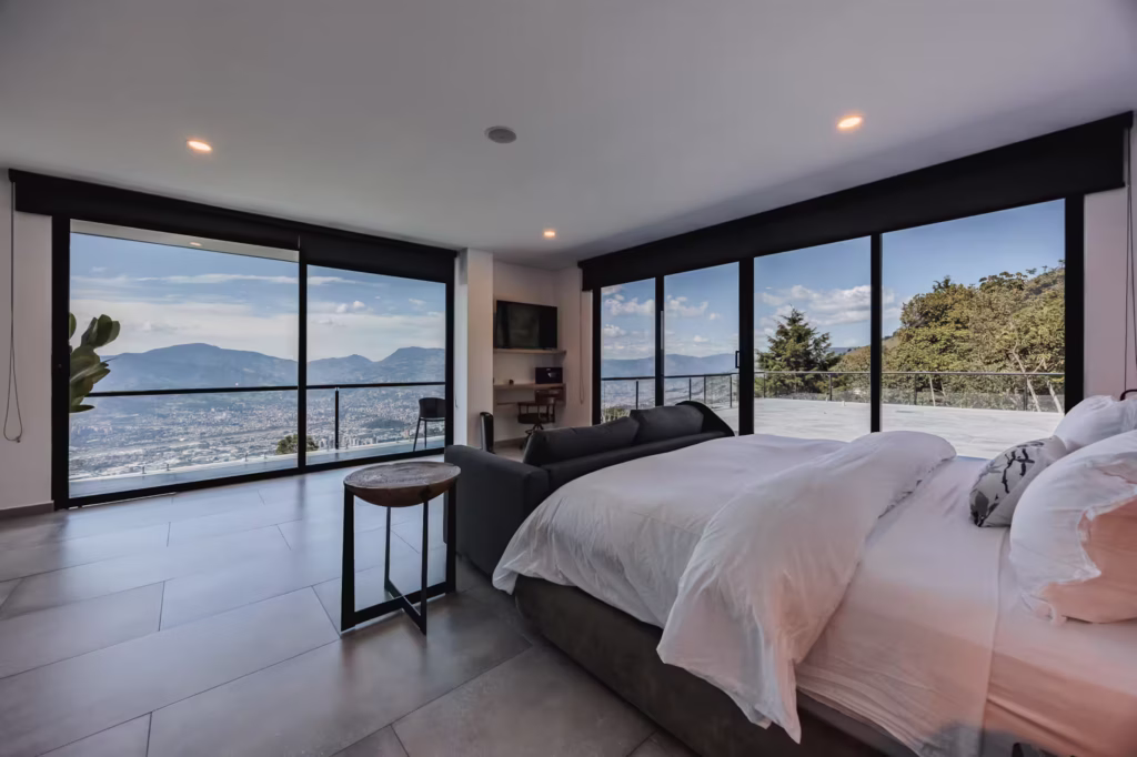 Casa Alba luxury villa in Medellín with private pool, hot tub, mountain views, and outdoor lounge space in Las Palmas