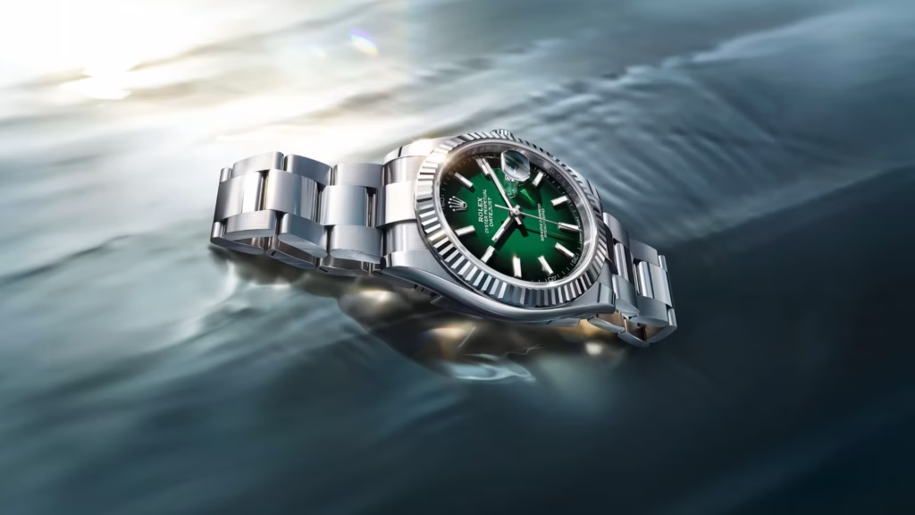 Rolex Datejust 41 in Oystersteel and white gold with green ombré dial, fluted bezel, and Oyster bracelet.