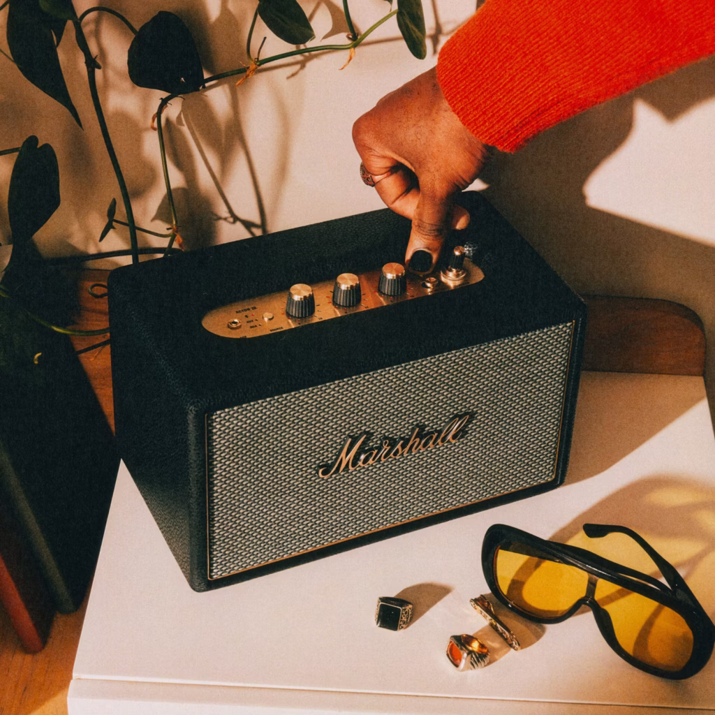 Marshall Acton IV wireless speaker styled as part of a modern home interior.
