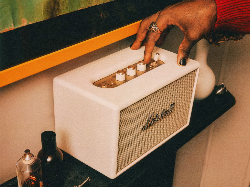 Marshall Acton IV wireless speaker styled as part of a modern home interior.