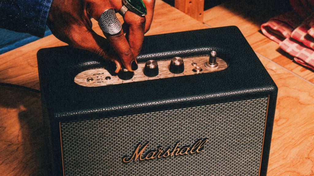 Marshall Acton IV wireless speaker styled as part of a modern home interior.