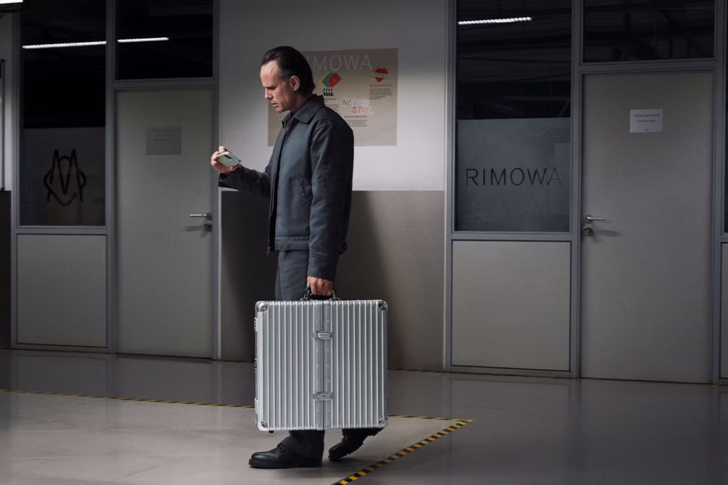 RIMOWA Dartboard Case showcasing the luxury grooved aluminum exterior, premium leather accessories, handcrafted details and portable design during the collaboration with professional darts brand Winmau.