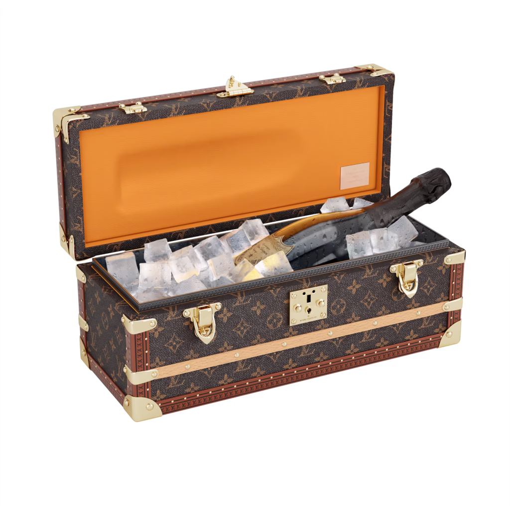 Louis Vuitton champagne trunk in Monogram canvas, shown in product views with orange interior, removable inserts and champagne bottle storage.