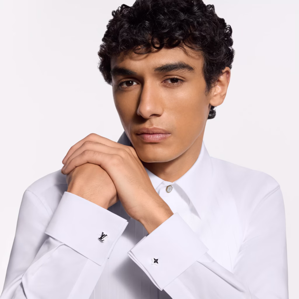 Louis Vuitton LV Spike cufflinks styled on a crisp white formal shirt